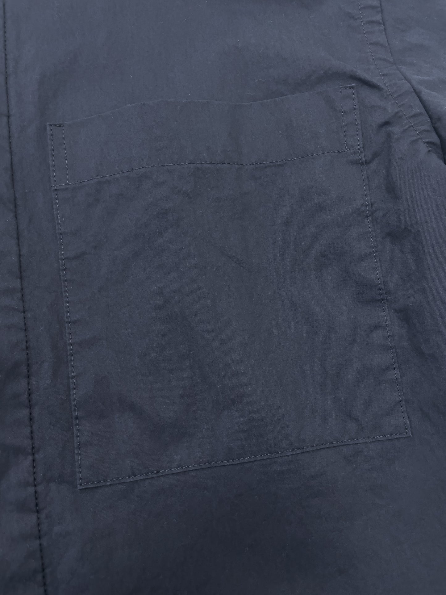paper like fabric over shirt