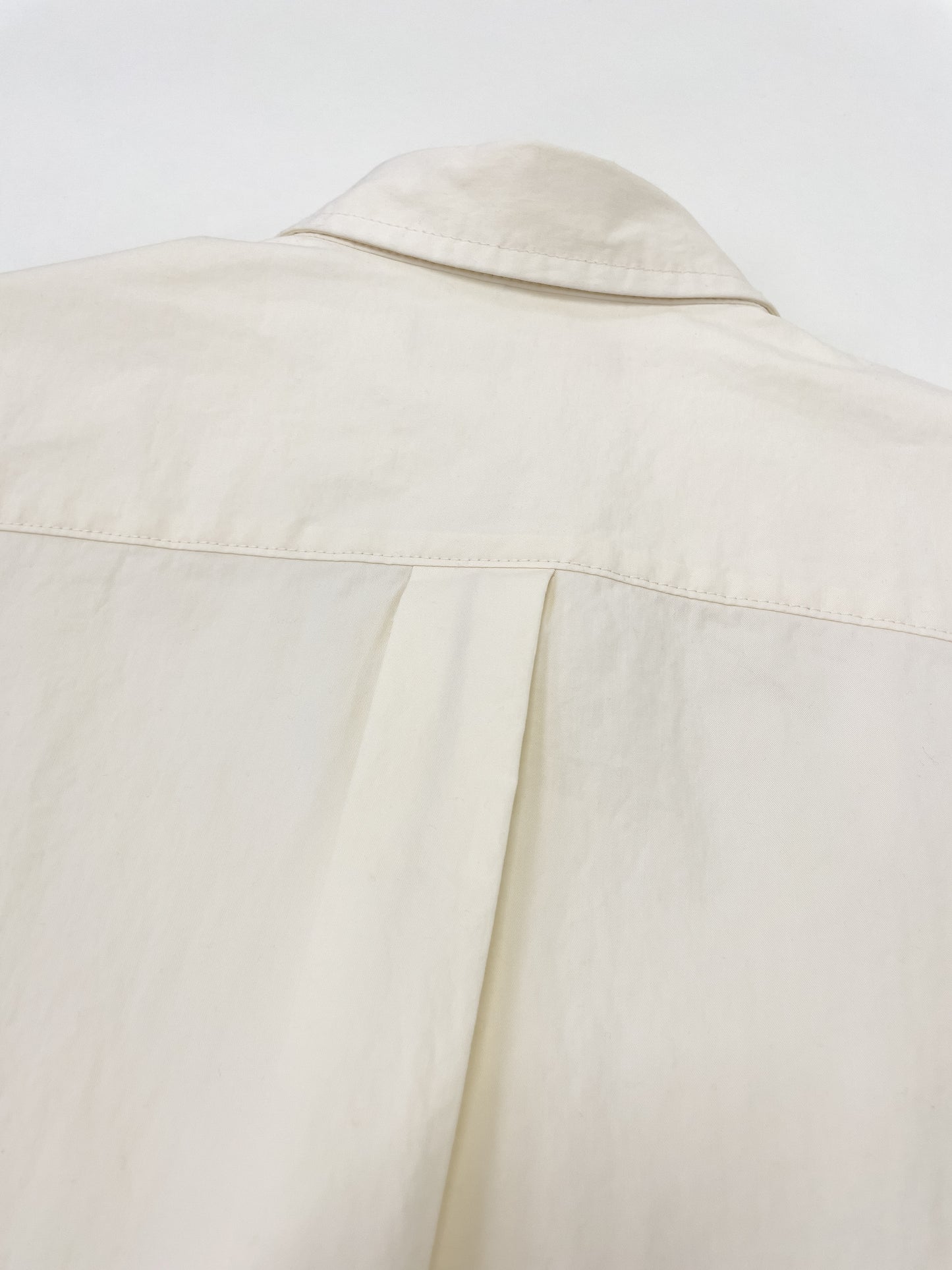 paper like fabric over shirt
